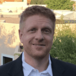 Tom Anderson, CEO, Devvio Inc