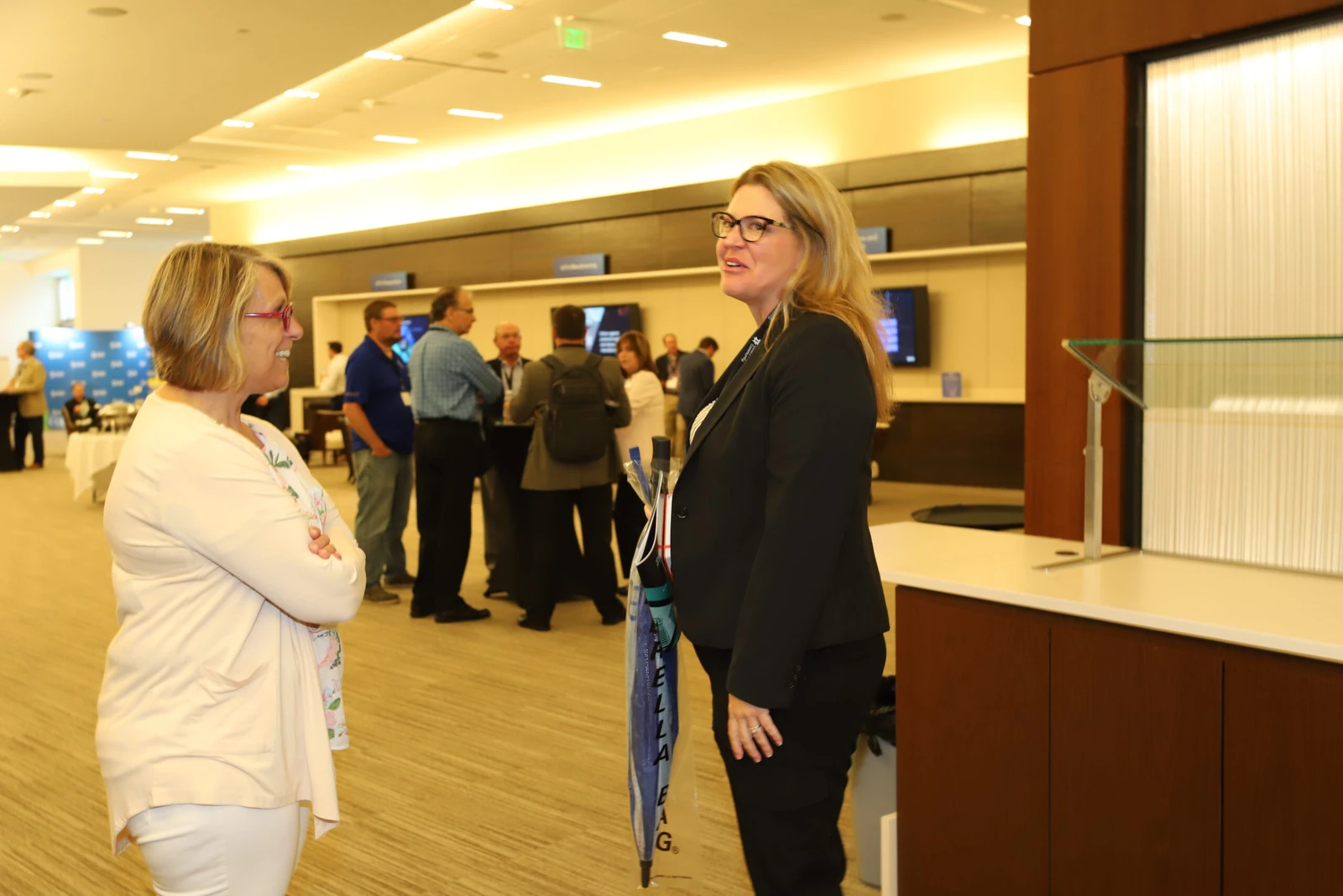 IoT Community members talking at an event